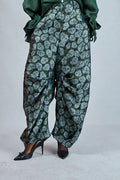 Odio Mimonet Cici green wide-leg pleated pants luxury African designer trousers, front view