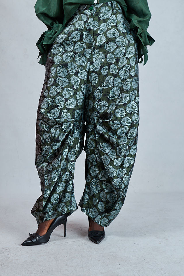 Odio Mimonet Cici green wide-leg pleated pants luxury African designer trousers, front view